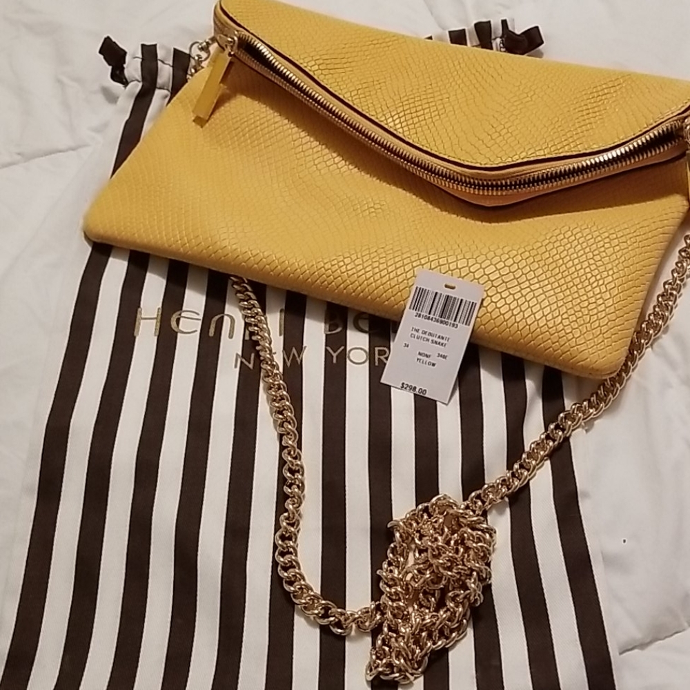 Henri Bendel yellow snake clutch